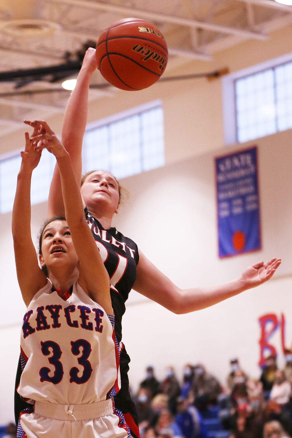 Denise Ortega-Chavez reaches for a ball that was thrown out of bounds